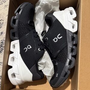 On Running Black and White Sneakers